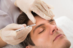 Young Man Having Botox Treatment